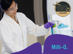 Scientist wearing safety glasses and gloves operates a Milli-Q water purification system in a laboratory; an award badge appears in the upper-right corner.