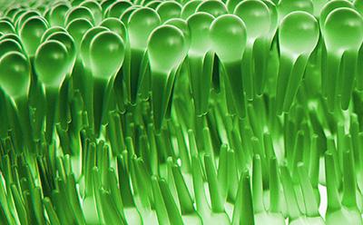 SPLASH Lipid Standard Mixtures for Lipidomics Close-up of glossy green, droplet-shaped structures arranged in dense rows, resembling a stylized microscopic surface.