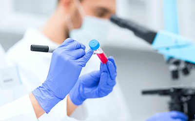 Scientists using labware in a Medical Device lab.