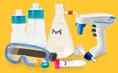 Labware Intro Bright yellow background featuring assorted labware: bottles, a large Erlenmeyer flask with a blue logo, a white handheld mixer, safety goggles, a pipette, a dropper, and other small lab accessories arranged together.