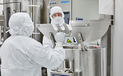 scientists in a manufacturing facility