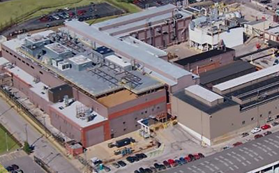 Exterior of CDMO manufacturing facility in St. Louis, Missouri — a US hub for complex small-molecule pharmaceutical development, scale-up, and GMP production