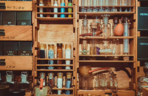Antique laboratory bench with  laboratory glassware and various reagents in test tubes.
