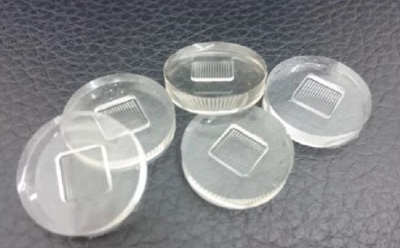 Microneedle template featuring a 10×10 array with uniform needle height and pyramidal geometry for controlled microneedle fabrication.