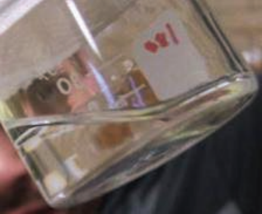 Beaker tilted after warming to soften the gel so that it can be poured Beaker tilted after warming to soften the gel so that it can be poured