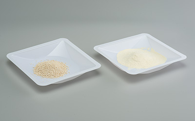 Granulated and powdered microbial culture media filled in bowls next to each other
