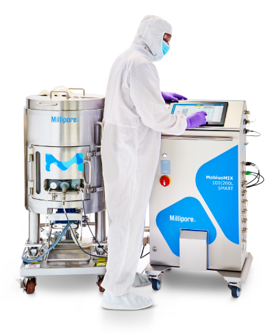 Mobius® MIX for Formulation System - 400x490 Image showing operator standing next to Mobius® MIX for Formulation System which contains two parts - a large stainless steel vessel on left whether the mixing occurs and a control box on right with control interface on top surface.