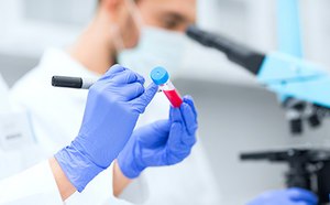 Scientists using labware in a Medical Device lab.