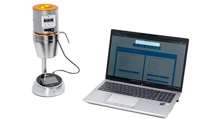 The MAS-100 Regulus Anemometer air sampler is shown alongside a laptop displaying browser-based software for wireless data transfer during calibration. The MAS-100 Regulus Anemometer air sampler is shown alongside a laptop displaying browser-based software for wireless data transfer during calibration.