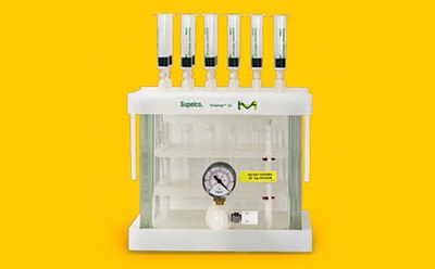 Nitinol-core SPME fiber La imagen representa un colector de laboratorio con base y estructura blancas, un indicador de esfera y ocho tubos de vidrio con llaves de paso.