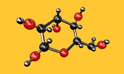 La imagen representa un modelo molecular tridimensional con nueve &aacute;tomos rojos y siete negros, que representan probablemente el ox&iacute;geno y el carbono, conectados por enlaces grises contra un fondo amarillo.
