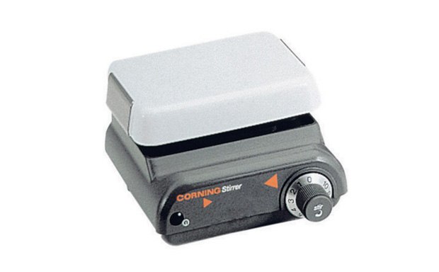 Corning<sup>®</sup> plate stirrer A Corning plate stirrer with a white top and a black base featuring control dials. The device is designed for laboratory use to stir liquids, ensuring consistent mixing for scientific experiments.
