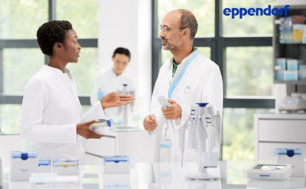 Eppendorf labware Scientists at lab table looking at Eppendorf labware