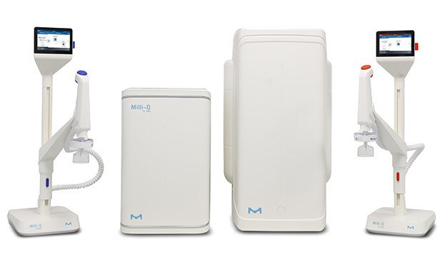 Milli-Q® IQ 7003/05/10/15 Pure and Ultrapure Water Purification System Two medical devices on stands with screens, one red and one blue, alongside a compact white unit and a larger white box. All devices feature the M logo.