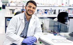 Scientist wearing a lab coat.
