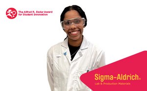 Headshot of Veronica on white background , red Sigma-Aldrich® cell in the right corner with yellow Sigma-Aldrich® logo and Bader Award logo on the left side.