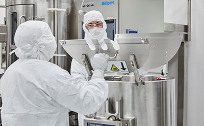 scientists in a manufacturing facility