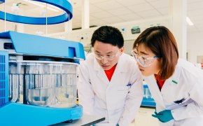 Quality and Regulatory for production-scale materials and custom services Scientists in production facility performing quality control and testing on production materials and bulk chemicals