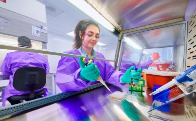 Woman working in a lab on stability testing studies.