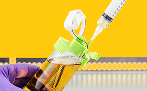 Steritest® Needle Guide A needle being used with the Steritest® needle guide to access the sterility test sample in a Steritest® NEO canister.