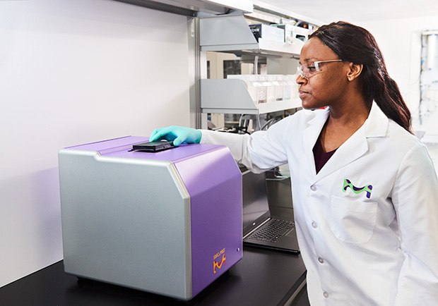 Ultrasensitive Single Molecule Counting (SMC®) Analysis for Cosmetics Research Image of a scientist performing analysis with ultrasensitive Single Molecule Counting (SMC®) technology on the SMCxPRO® platform which can be applied to cosmetics and personal care product research.